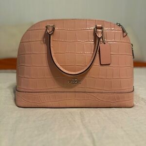 NEVER USED Coach Bag 
I bought it and never had use for it so finally selling it